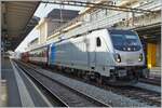 Ungewöhnliches in Lausanne: ein  Auto im Reisezug  Test-Komposition? Oder ist der zu testende Laaeffrs 560.4 (25 80 4382 302-4Ten D-ATG)  nur  ein gewöhnlicher Autotransport Wagen. Jedenfalls freute ich mich über die Railpool 187 009-6 (91 80 4618 009-6 D-Rpool) die ich mit ihrem bunten Testzug in Lausanne aufnehmen konnte.

4. März 2023