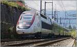 Der inoui TGV Rame 4715 bei Villeneuve mit eine blauen Zwergsignal, wie sie bei ETCS Betrieb Verwendung finden.